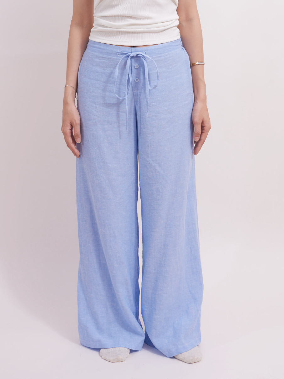 Front view of baby blue slim-fit linen lounge pants with drawstring and elastic waistband, ideal for smart casual and working from home.