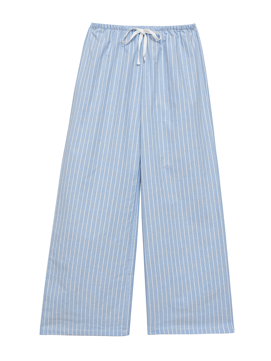 Full view of low-rise wide-leg lounge pants in blue pinstripes, made from thick 100% cotton Oxford fabric, with a relaxed, casual fit ideal for lounging.
