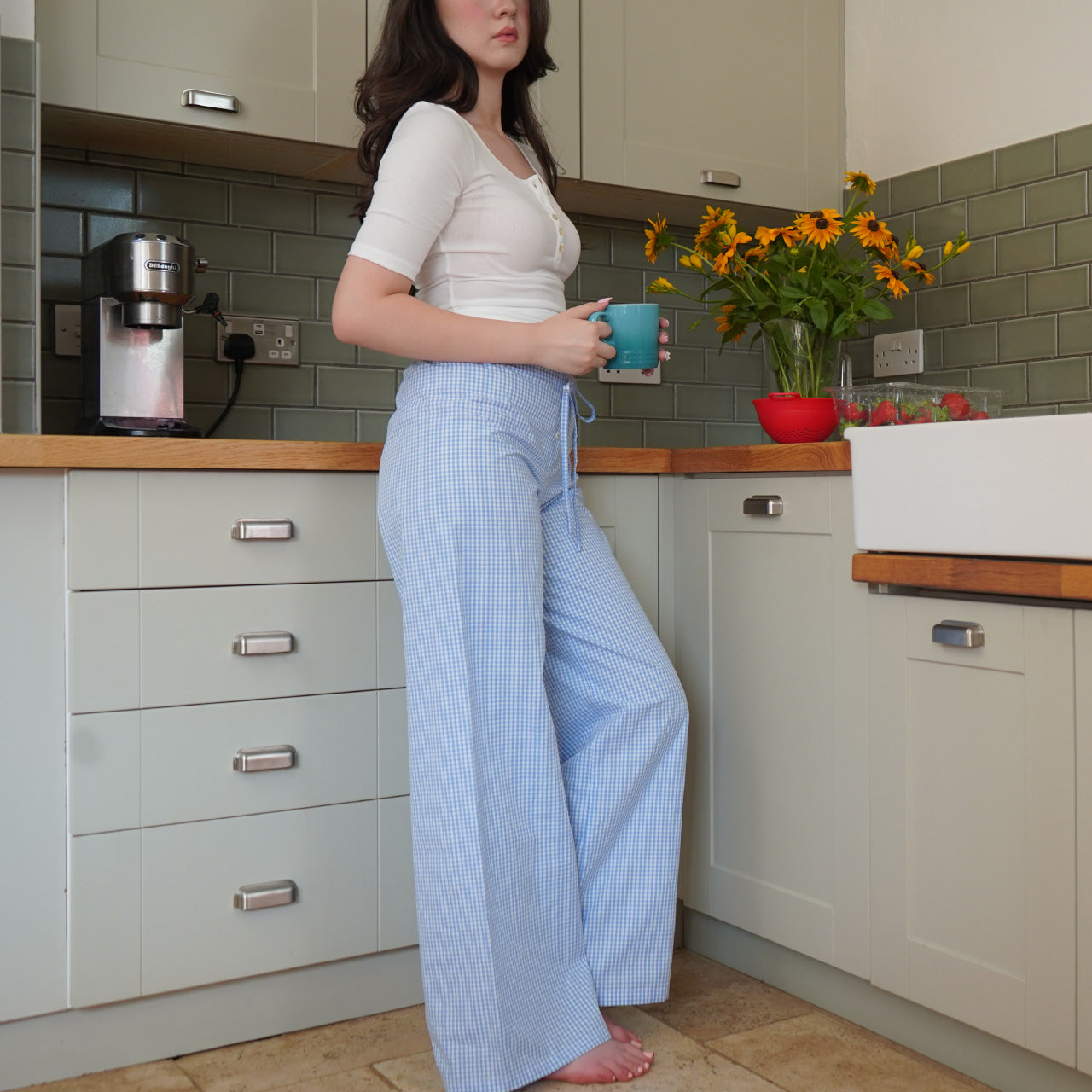 Ice blue gingham wide-leg lounge pants with a low-rise waist and a loose fit, perfect for casual lounging and working from home.