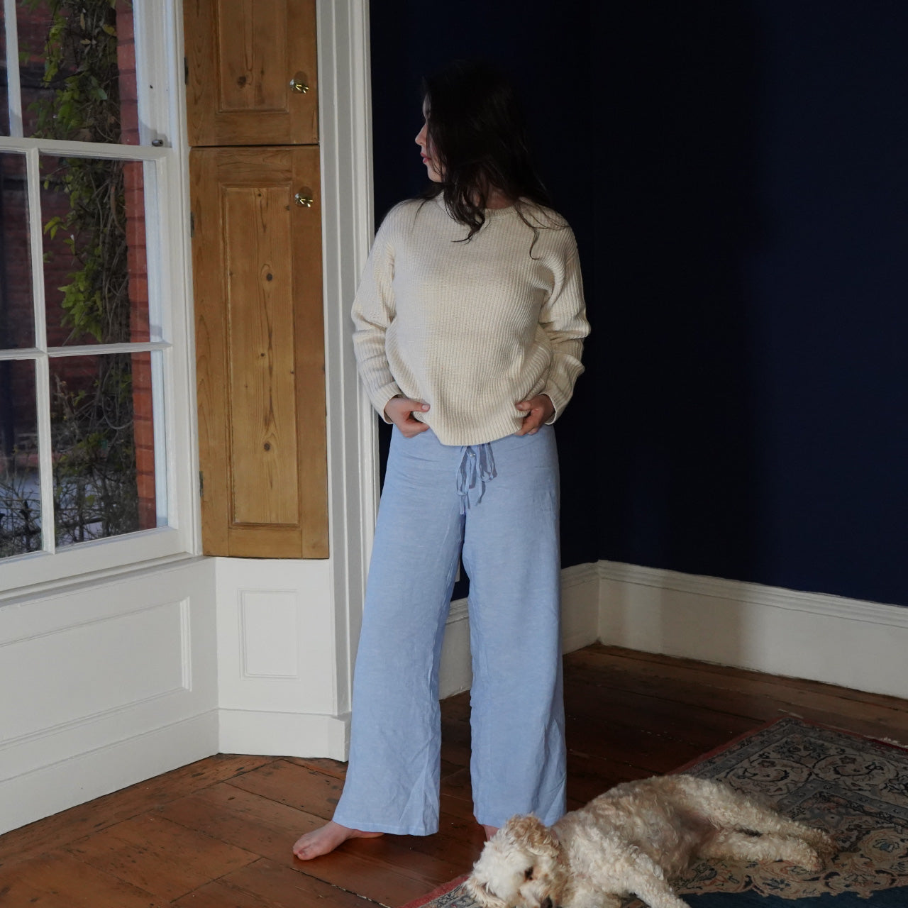 Sky blue linen fitted wide-leg lounge pants with a low-rise featuring elastic waistband, drawstring, relaxed flowy linen trousers