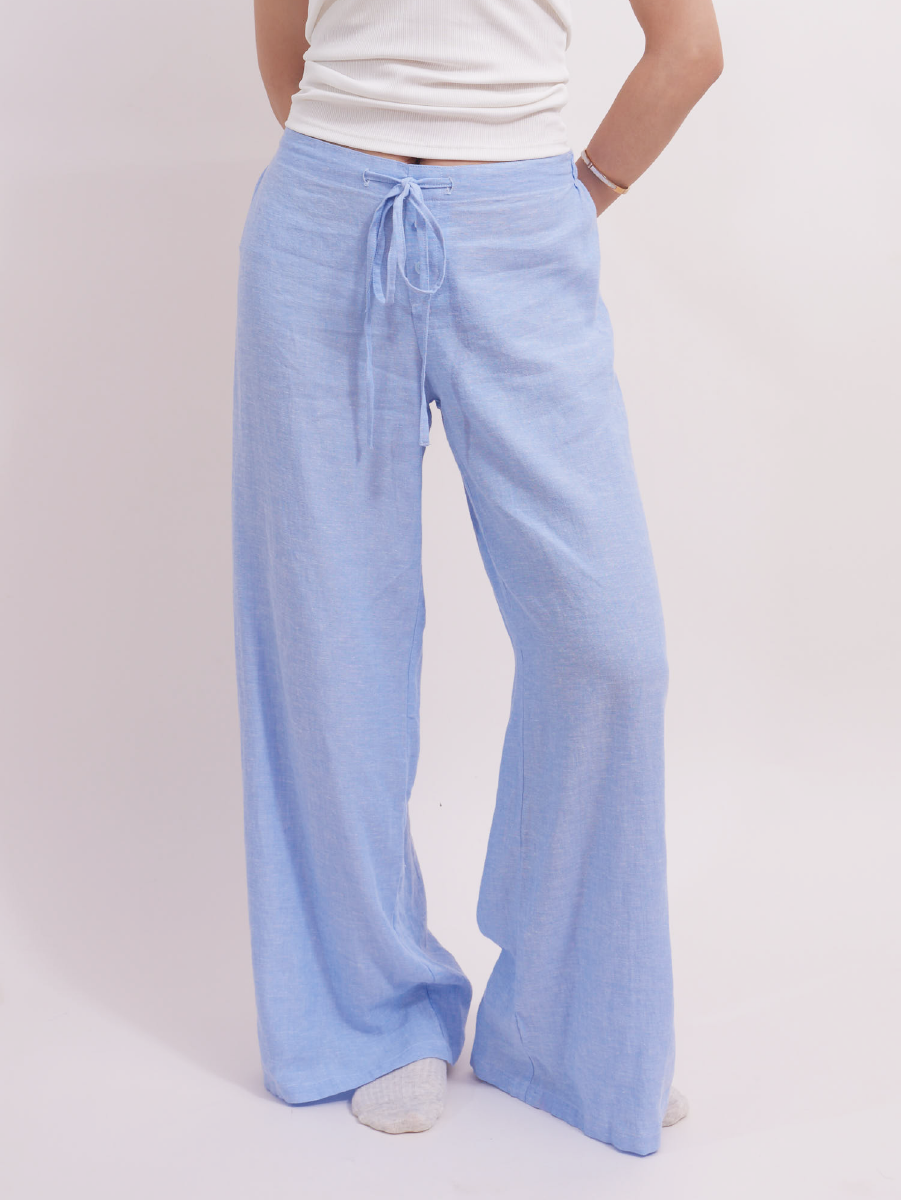 Relaxed yet slim-fit baby blue linen lounge pants, soft and breathable, great for a smart look while working from home.
