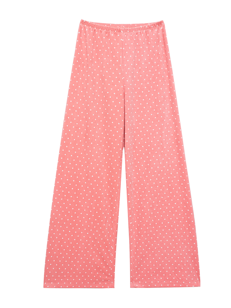 Flat lay of high-rise pink polka dot fleece lounge pants, wide leg and soft winter pyjamas.