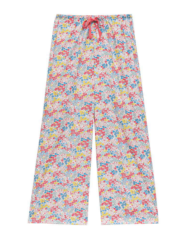 
                                            
                                                Full-length view of low-rise wide leg lounge pants in pastel pink ditsy floral print. These 100% cotton pants feature a red drawstring and relaxed fit, ideal for lounging or sleepwear.
                                            
                                        