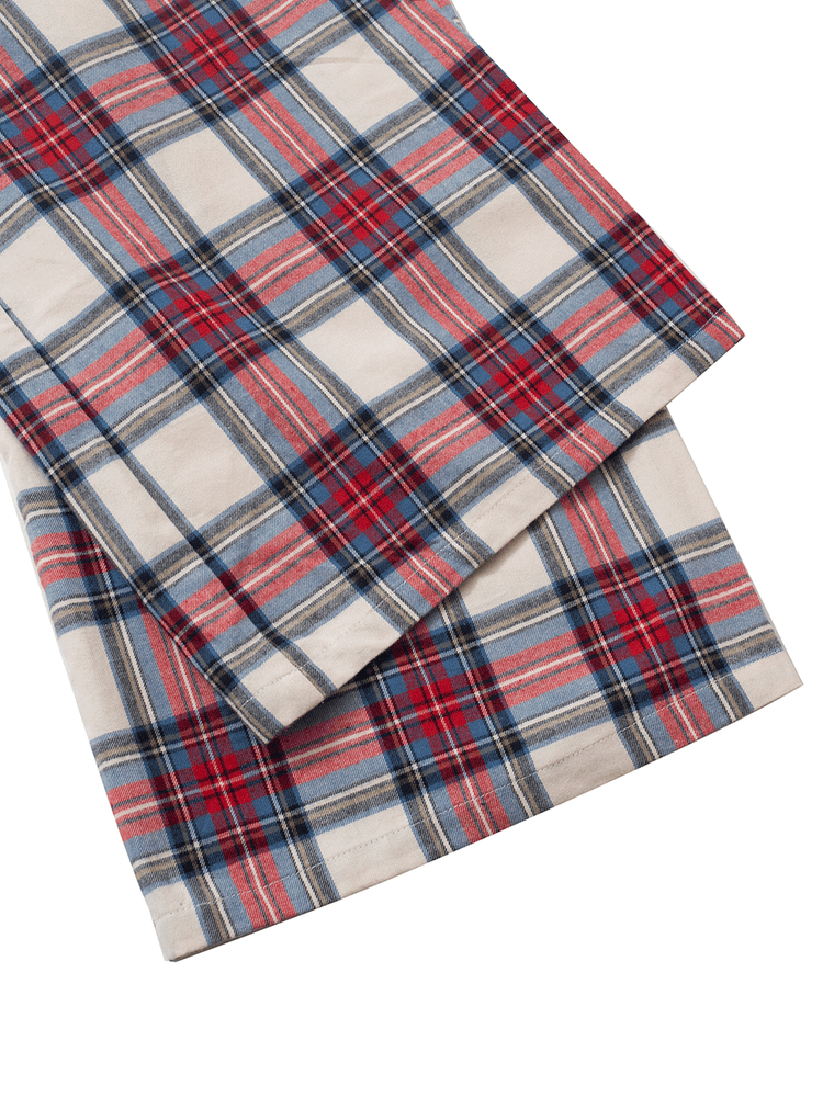 
                                            
                                                Hem detail of low-rise wide leg lounge pants in red and cream plaid tartan, crafted from soft brushed cotton flannel for a comfortable fit in cool weather.
                                            
                                        