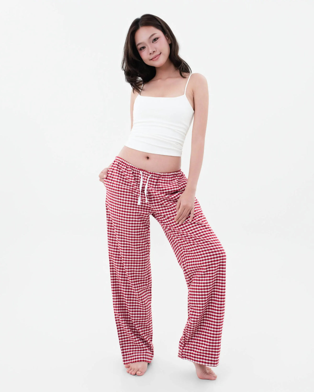 Model wearing SleepyPants Lounge Low Rise red and white gingham cotton flannel pyjama bottoms
