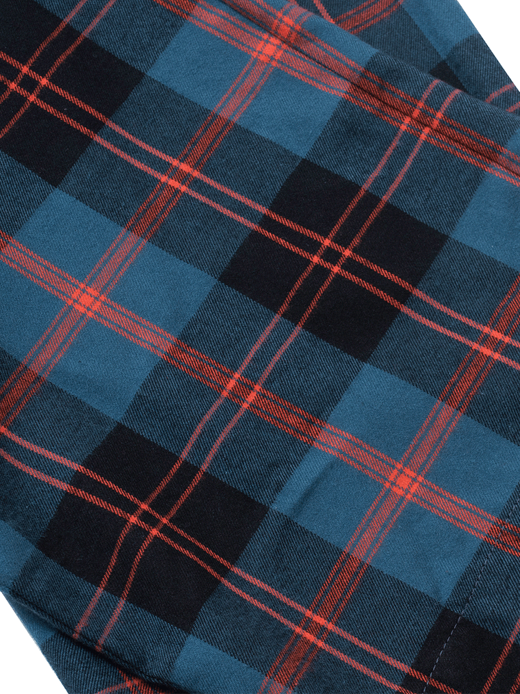 
                                            
                                                Hem of royal blue plaid pyjama bottoms in warm brushed cotton.
                                            
                                        