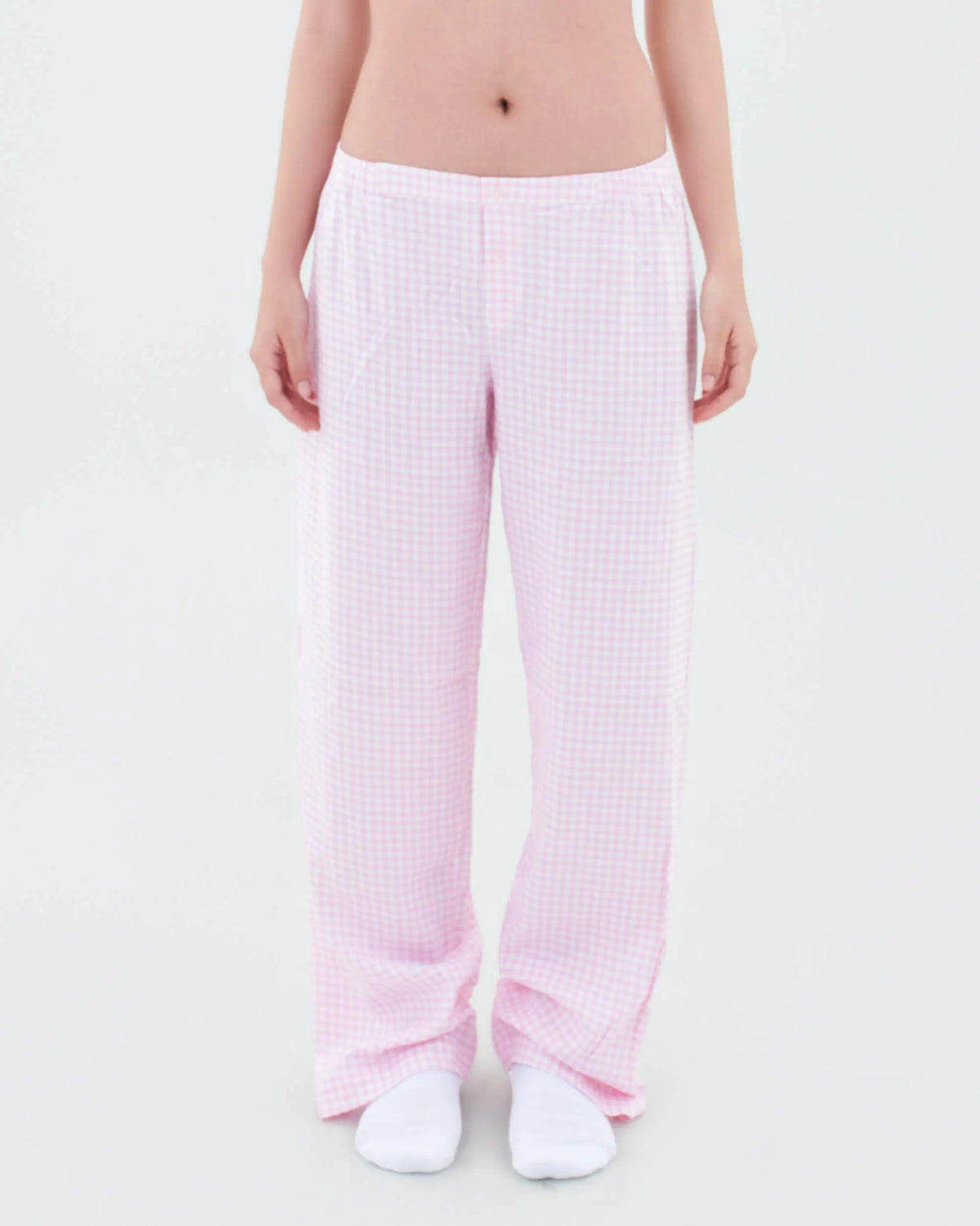 Front view of SleepyPants Seamless Low Rise pink and white gingham linen pyjama bottoms